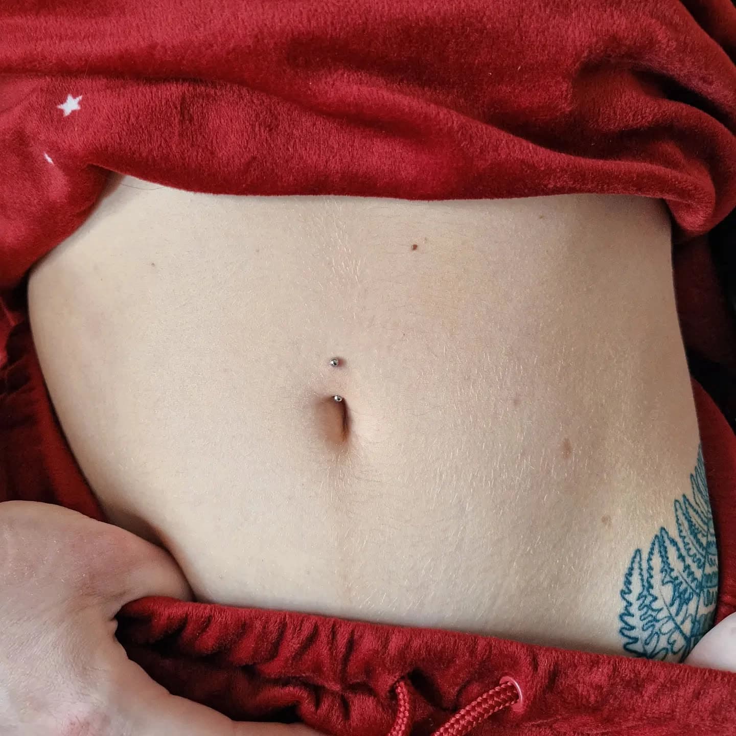 Small navel piercing